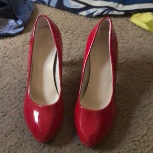 Red high-heeled pumps
